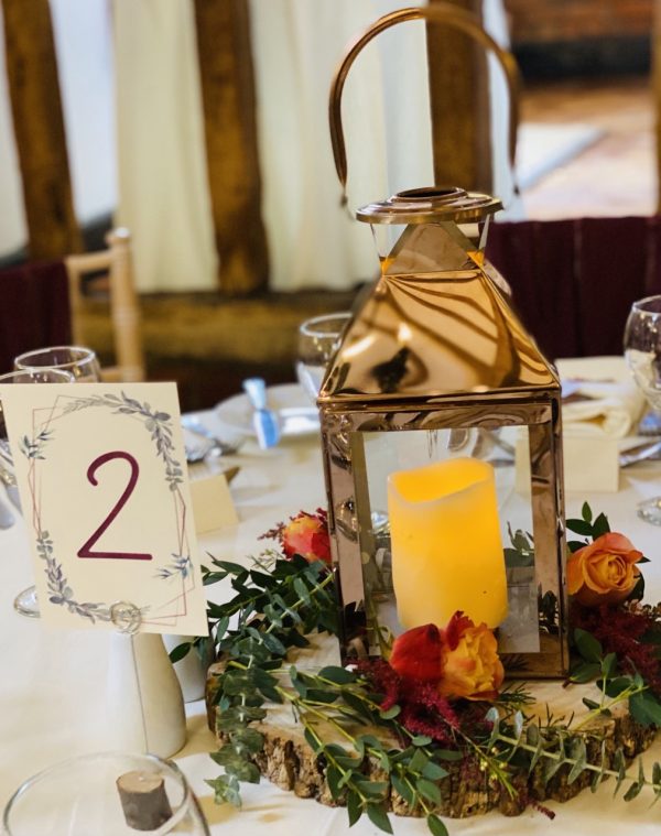 Log Slice with Copper Coloured Lantern